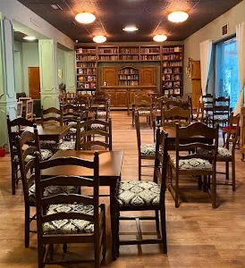 Books and tables inside Le Chateau