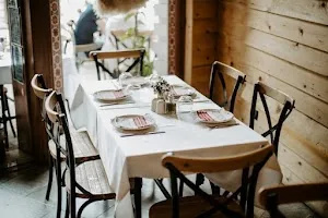 Dining tables at Ceren Ismet Shehu Kalaja